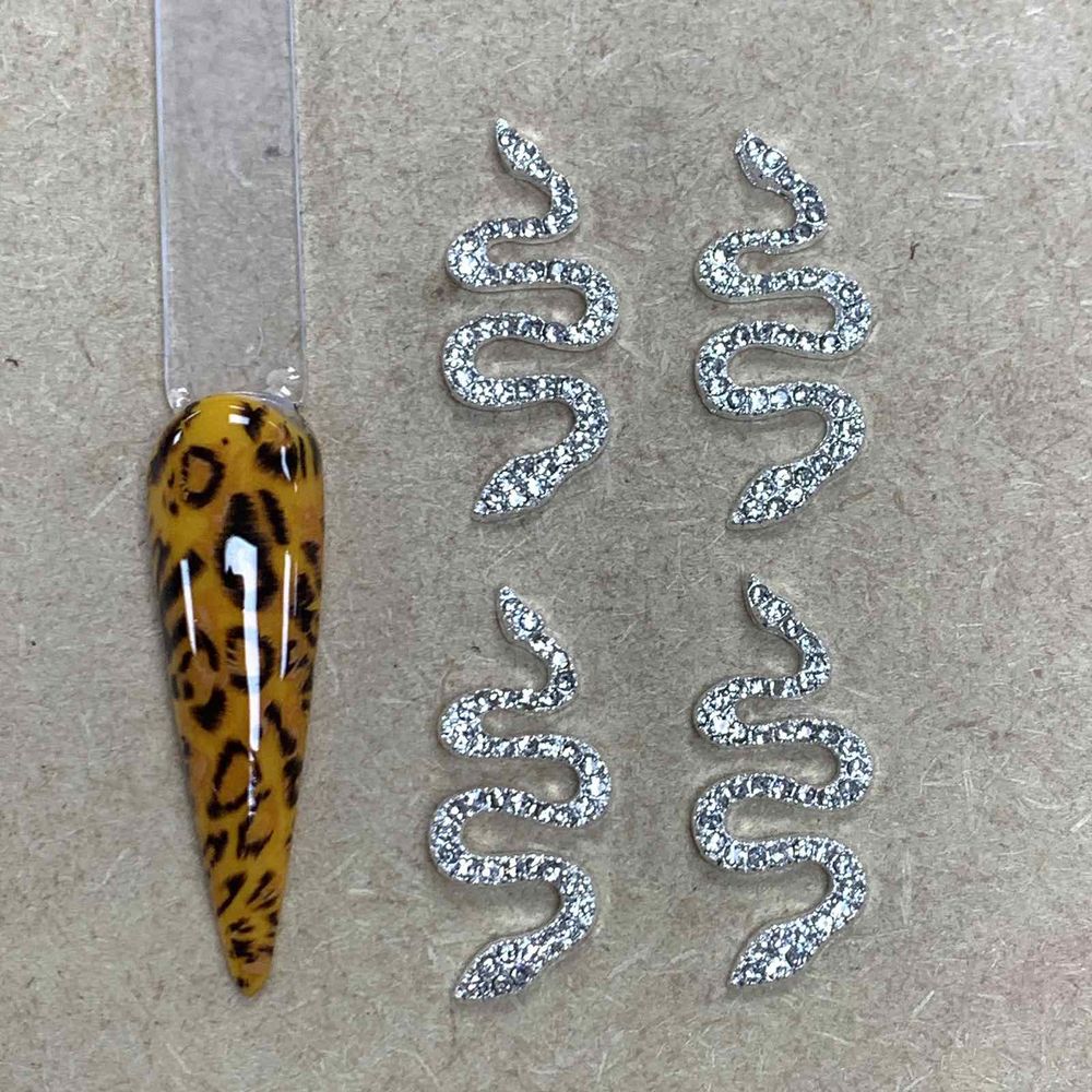Gold and silver 3D snake charms - 3